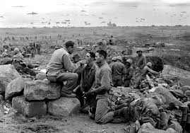 1945 Two Marines receive communion on Iwo Jima